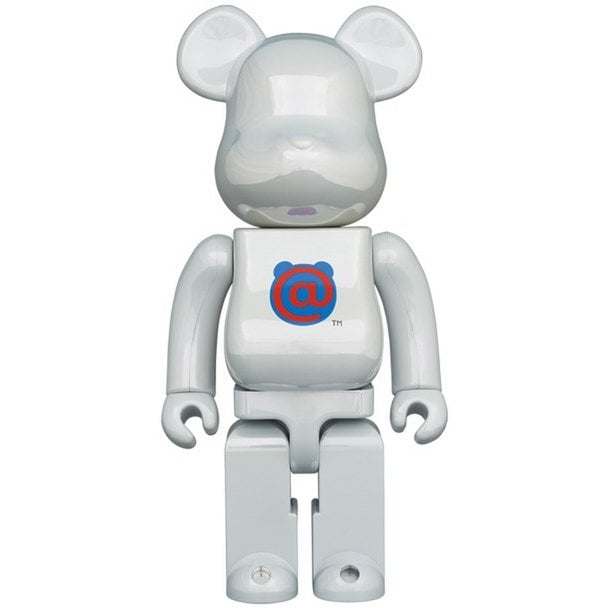 400% Bearbrick figure with white chrome body and original Bearbrick logo in blue and red on chest