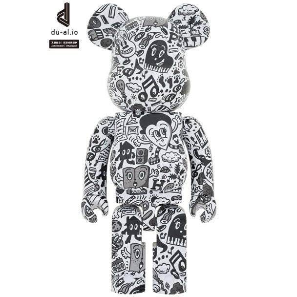 1000% Bearbrick featuring black and white Chocomoo street art design.