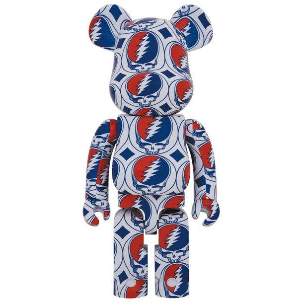 1000 Bearbrick figure featuring Grateful Dead Steal Your Face logo pattern in red, white, and blue