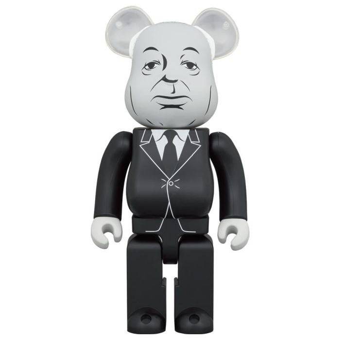 400% Bearbrick Alfred Hitchcock figure in monochrome suit with distinct face details and silhouette logo on back.
