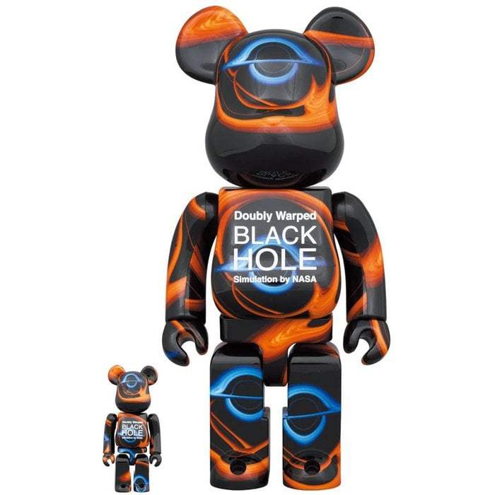 400% and 100% Bearbrick set featuring NASA Doubly Warped Black Hole design with orange and blue space graphics